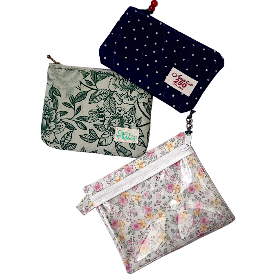 three trendy small pouches 